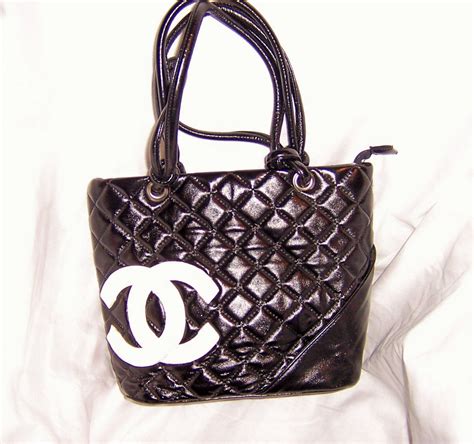 black chanel purse white logo|expensive black purses quilted chanel.